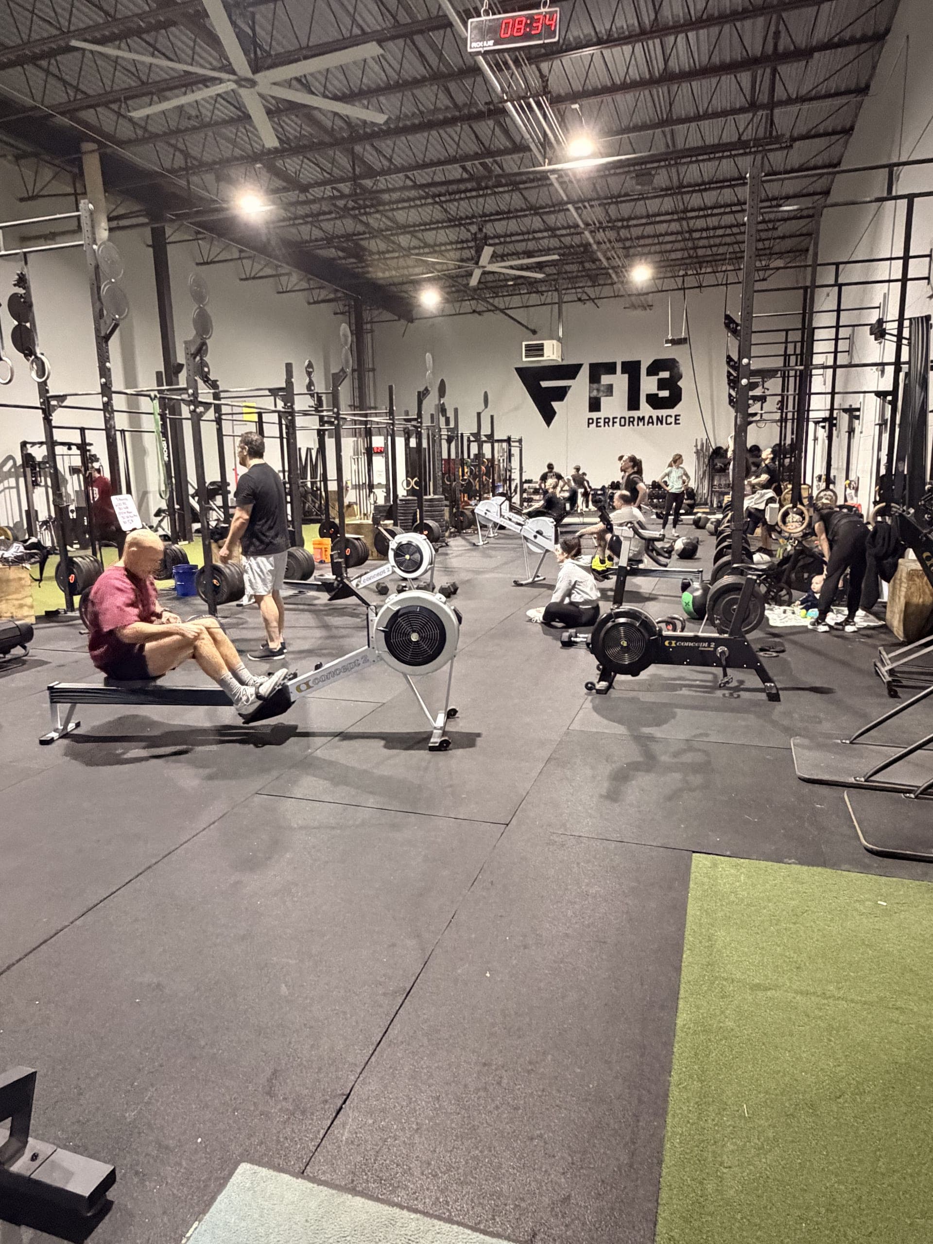 F13 Performance members training on Concept2 rowers during a class in Allentown PA